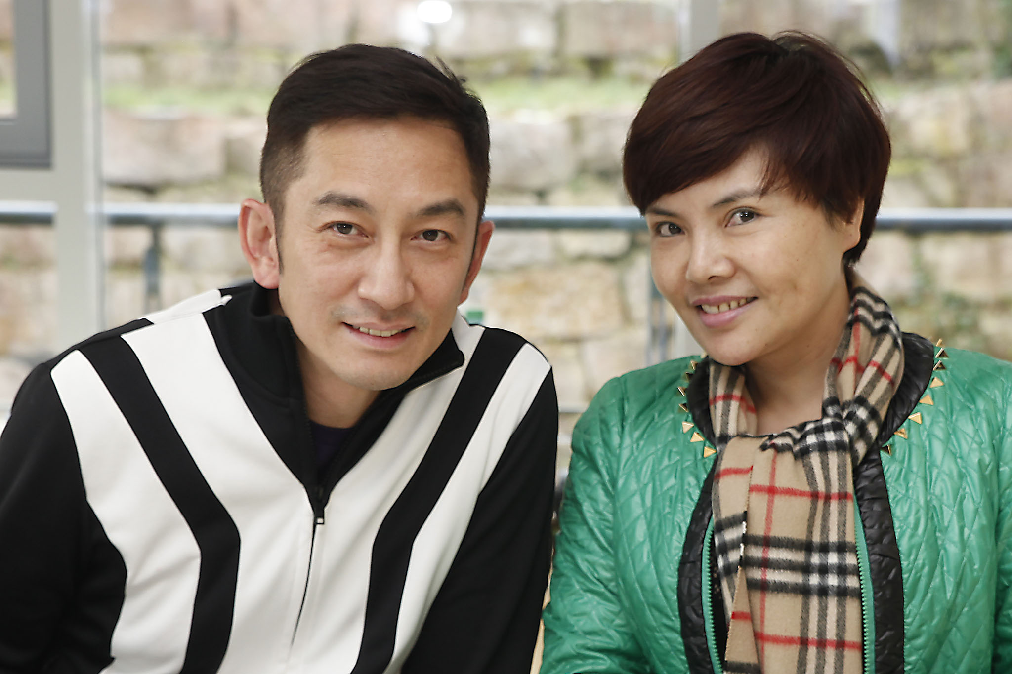 Andy Lau_Prominentenfoto, mit Frau schauen in die Kamera